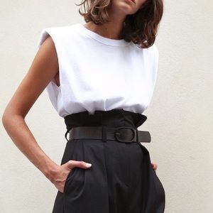 White shoulder pad shirt